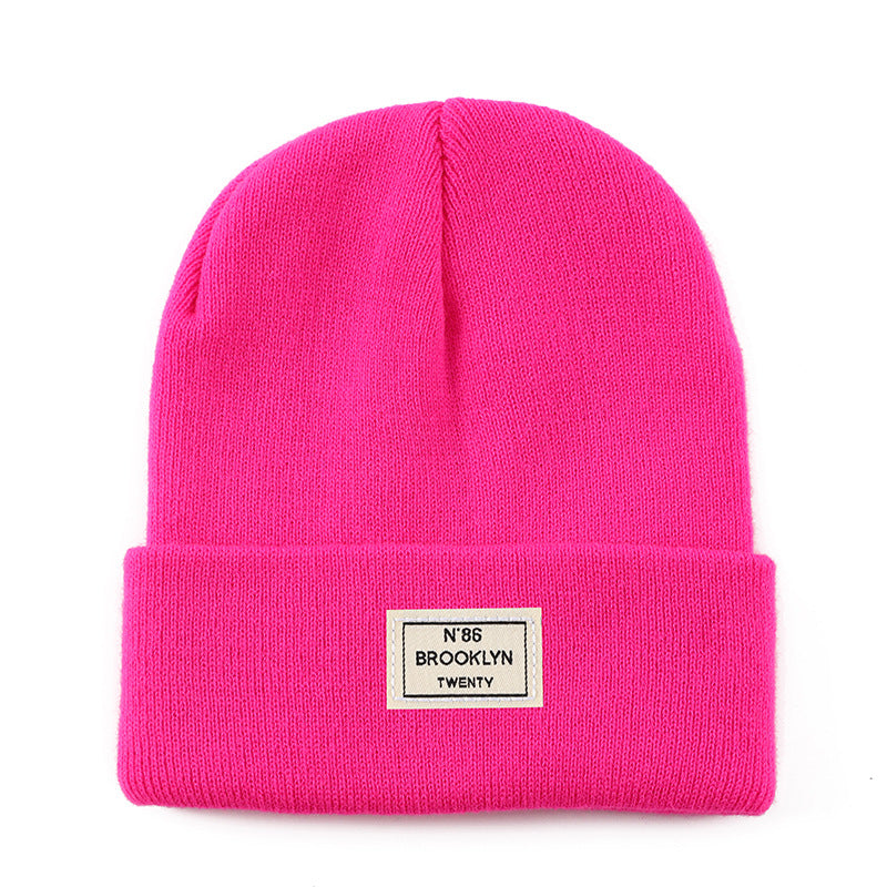 Knitted Beanie With Brand Label Stylish And Fashionable